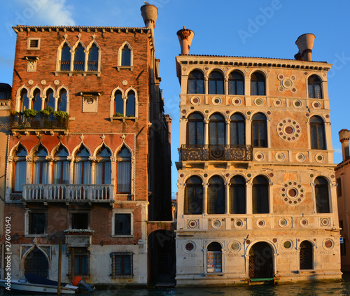 : At sunset the Grand canal in Venice is a city in northeast Italy sited on a group of 118 small islands. More than 20 million tourists come to Venice annually.