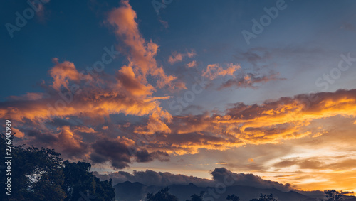 Beautiful sky in the evening and golden clouds © artrachen