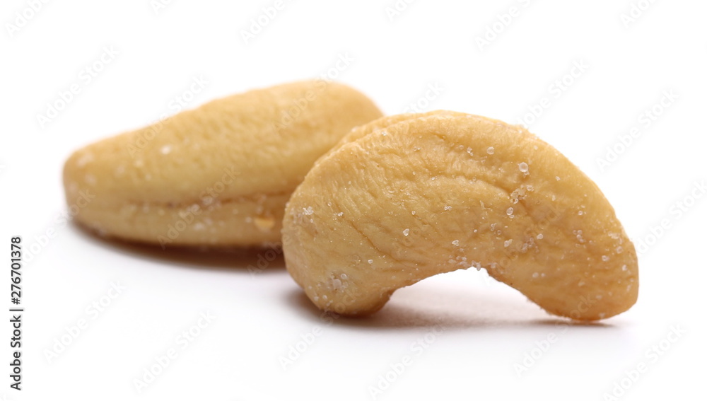 Fototapeta premium Salted cashew nuts isolated on white background