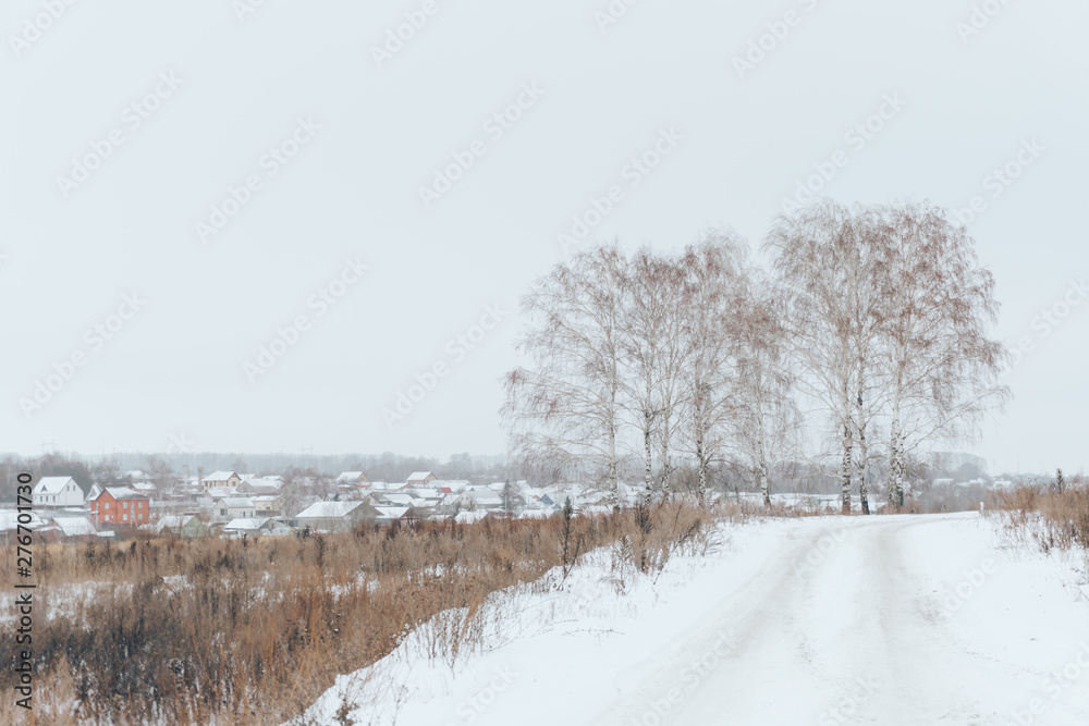 winter landscape of a deserted snow field and leaden sky winter landscape of a deserted snow field and leaden sky