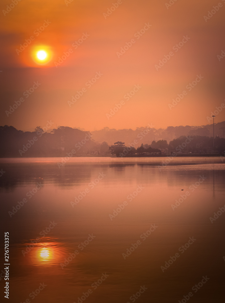 Sunrise over Xuan Huong Lake, Dalat, Vietnam Sunrise over Xuan Huong Lake, Dalat, Vietnam