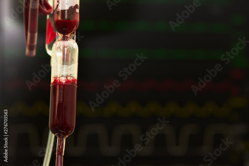 Blood bag hanging for transfusion in operating room photo