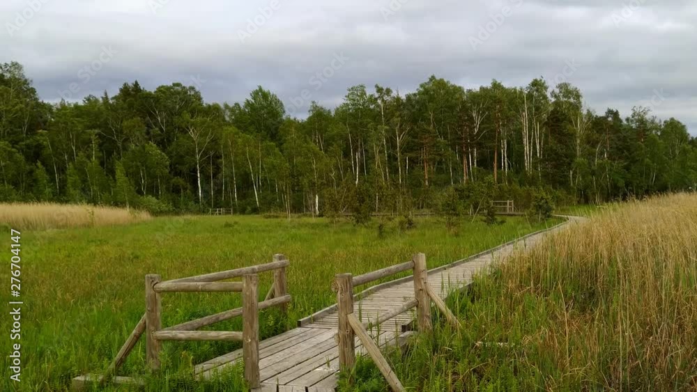 Wide view on bog at lake Kanieris in Kemeri national park in Latvia Wide view on bog at lake Kanieris in Kemeri national park in Latvia