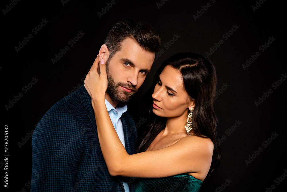 Close up side profile photo beautiful she her wife earrings he him his husband married spouse celebrities pop stars actors hand face want kiss wear costume jacket green dress isolated black background