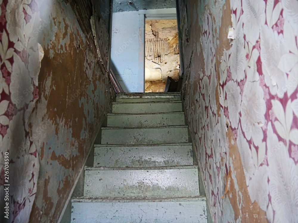 Wide view of old original stairs of an 1880s hotel building in South Dakota. 