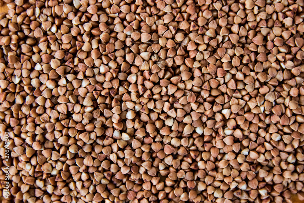 Buckwheat Seeds on a wooden board Buckwheat Seeds on a wooden board