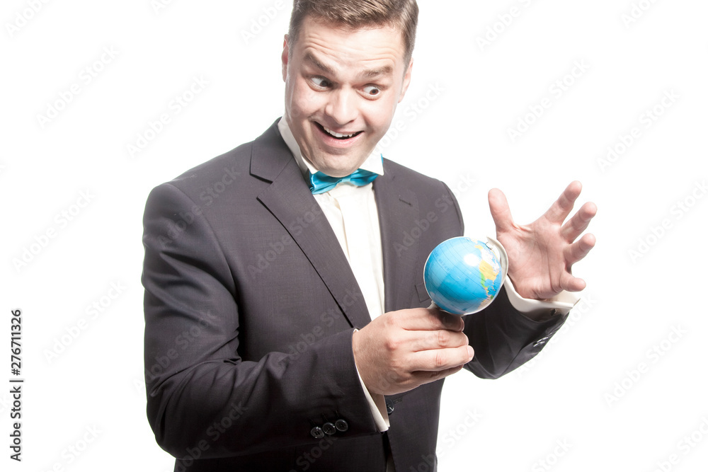 Funny man in blue bow tie holding little glode with crazy, weird face. Funny man in blue bow tie holding little glode with crazy, weird face.