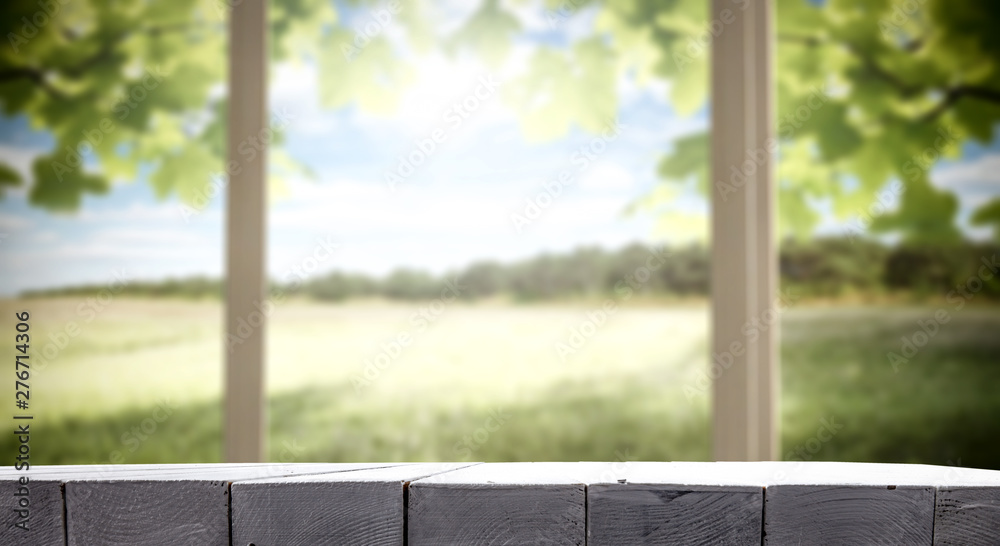 Fototapeta premium Desk of free space and summer window background 