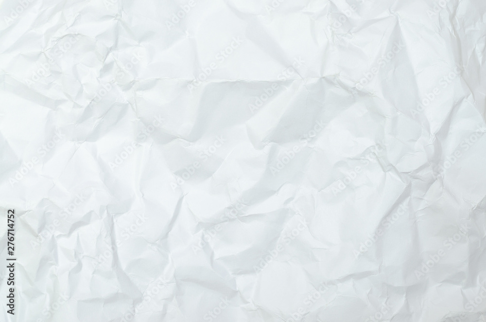 White crumpled paper texture background. creased paper. White crumpled paper texture background. creased paper.