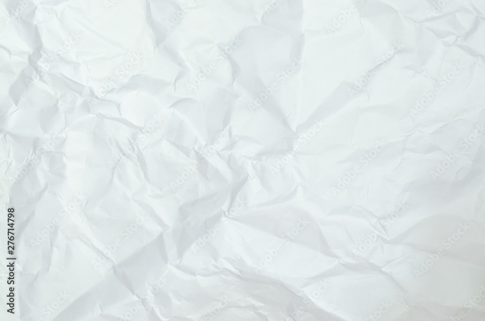 White crumpled paper texture background. creased paper. White crumpled paper texture background. creased paper.