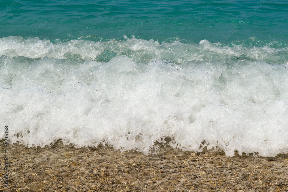 Deep blue stormy sea water surface with foam and waves pattern, natural background photo