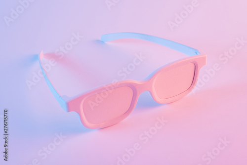 Painted eyeglasses against pink background