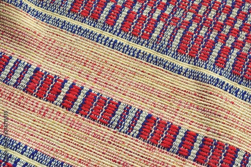  texture of the fabric of the old multi-colored bedspread
