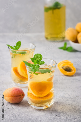 Summer drink, apricot mint tea. Selective focus, space for text.