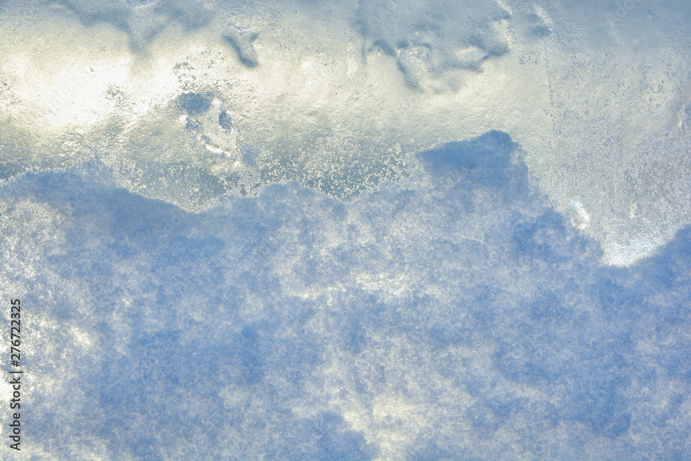 The texture of the ice. The frozen water.Winter background The texture of the ice. The frozen water.Winter background