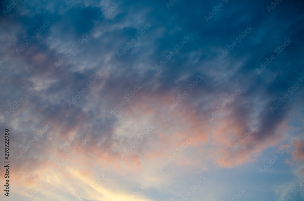 Sky background. Colorful clouds at sunset