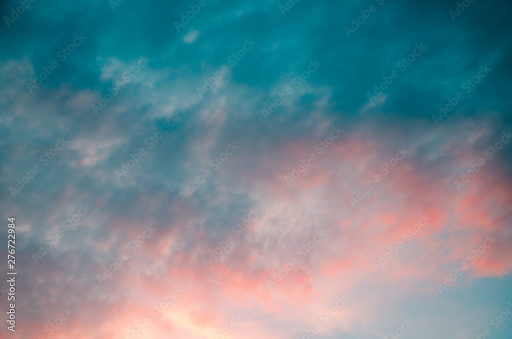 Sky background. Colorful clouds at sunset