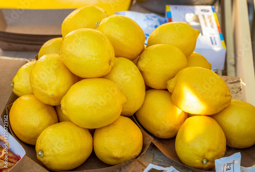Lots of yellow lemons stacked in a pile