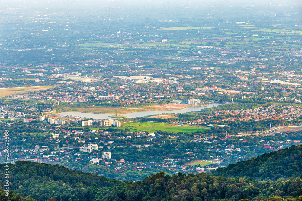view in the mountains with cityscape over the city of Chiang Mai, Thailand at daytime.