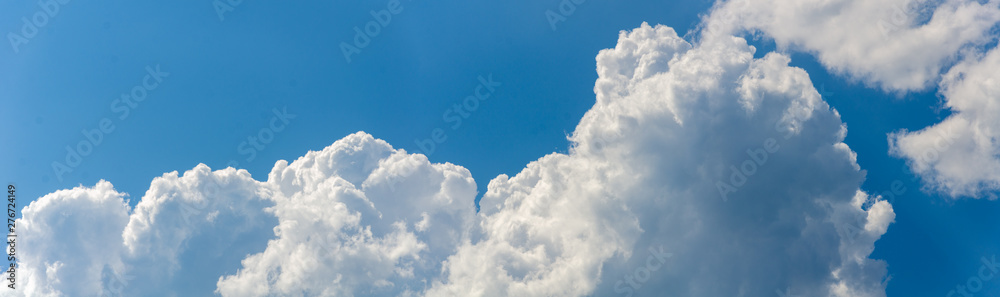 Panorama of blue sky with white cumulus clouds Panorama of blue sky with white cumulus clouds