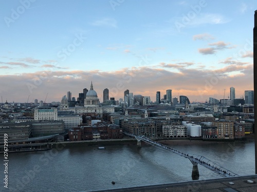 Panoramic aerial view at sunset across the City of London and the Thames river 