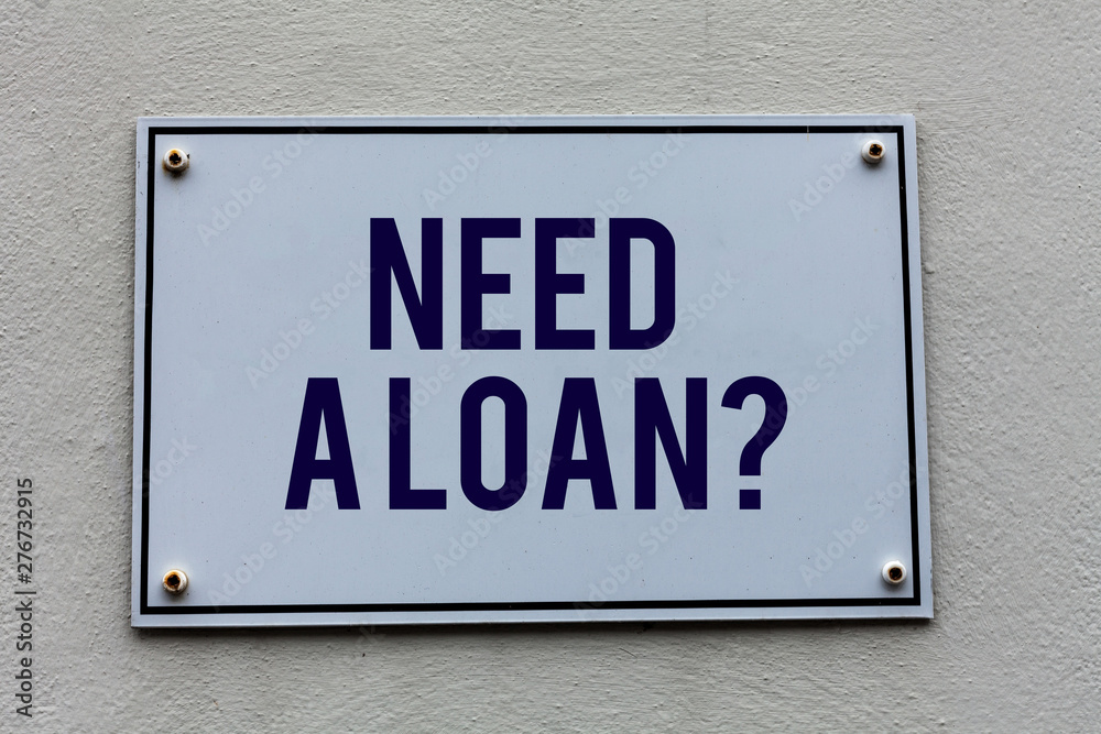 Conceptual hand writing showing Need A Loanquestion. Concept meaning offering a money for demonstratingal or business finances Conceptual hand writing showing Need A Loanquestion. Concept meaning offering a money for demonstratingal or business finances