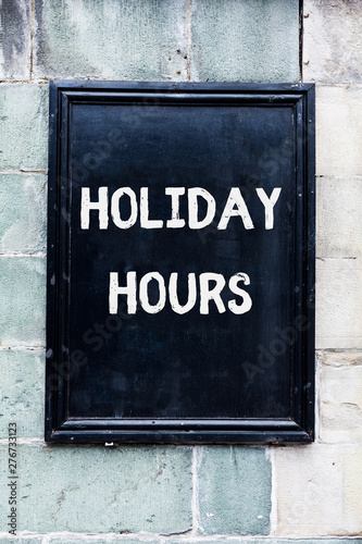 Word writing text Holiday Hours. Business photo showcasing employee receives twice their normal pay for all hours