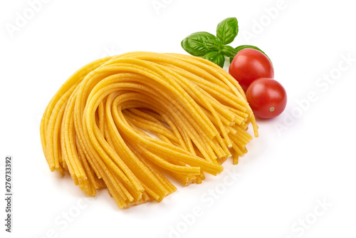 Italian pasta, ingredients for cooking, raw spaghetti, close-up, isolated on white background