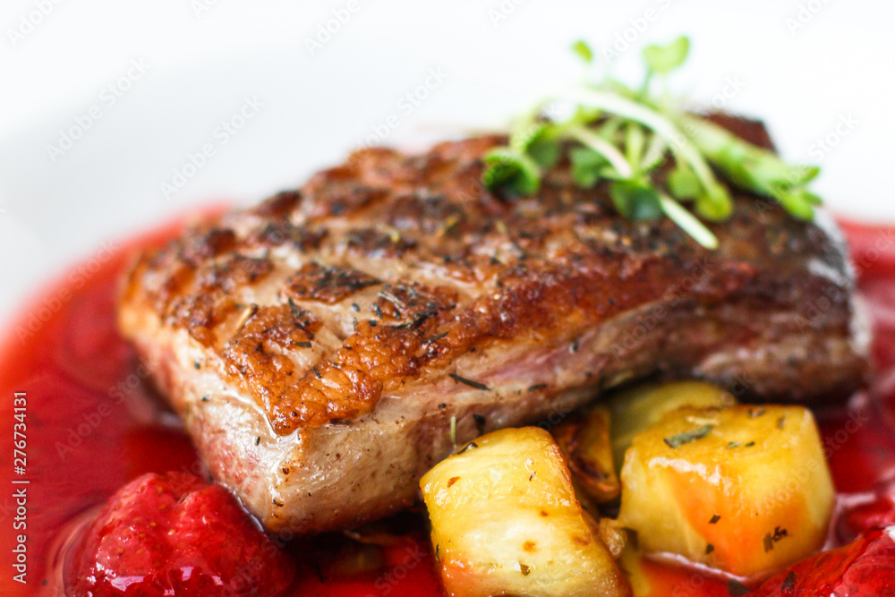 duck breast and berry sauce (fine dining) bon appetit. top food background. copy space