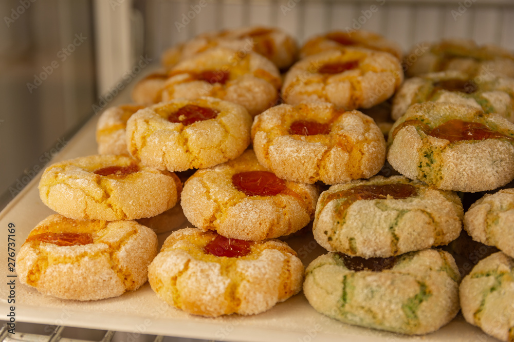 Amaretti pasta reale, italian almond pastries with colored candied fruit.