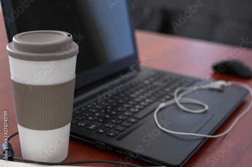 Laptop on a table at modern office