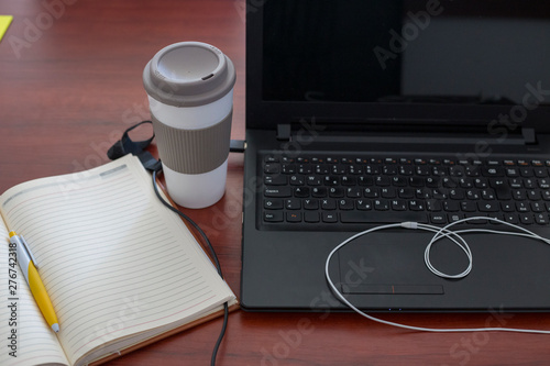 Laptop on a table at modern office