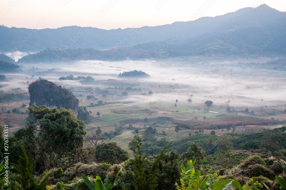 Fototapeta premium Scenic mountain landscape and fog on the hill in Phu Lung ka in Phayao province, Thailand