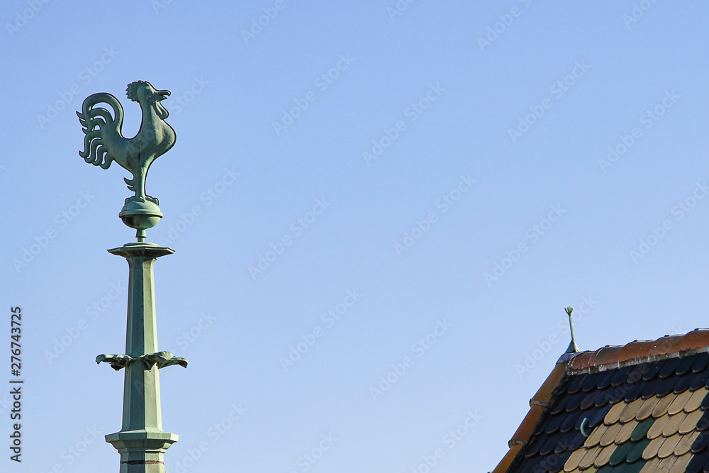 The spire of the Cathedral of St. Stephen crowned with a bronze rooster The spire of the Cathedral of St. Stephen crowned with a bronze rooster
