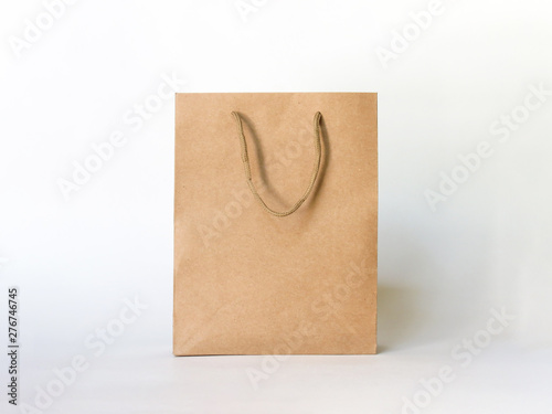 Empty Brown Paper Shopping Bag for advertising and branding isolated on white Background. Mock up. High Resolution. Mockup for design
