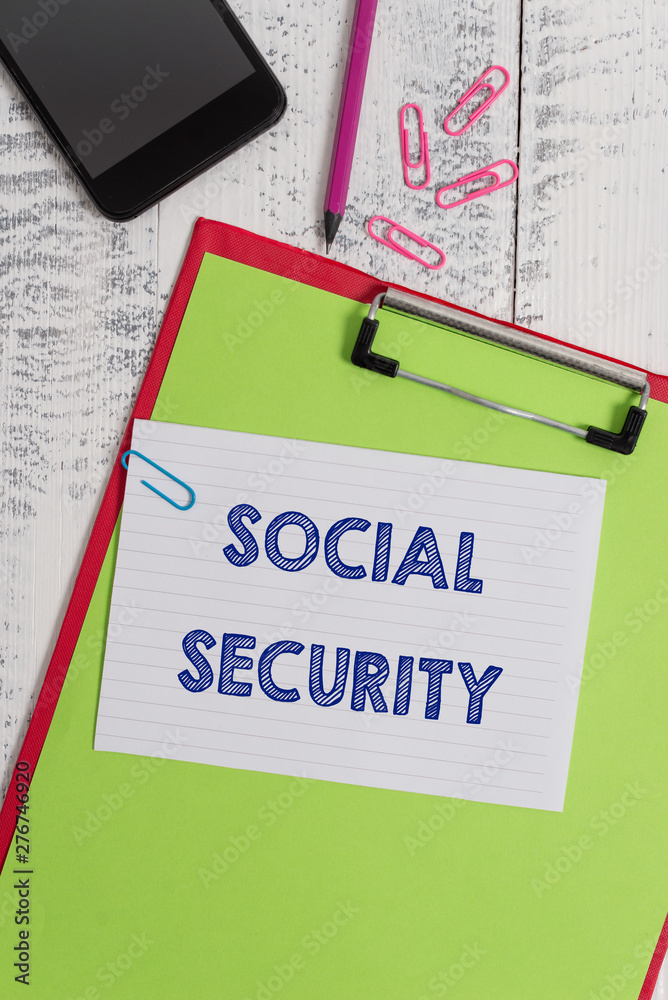 Writing note showing Social Security. Business concept for assistance from state showing with inadequate or no income Clipboard sheet pencil smartphone squared note clips wooden background Writing note showing Social Security. Business concept for assistance from state showing with inadequate or no income Clipboard sheet pencil smartphone squared note clips wooden background