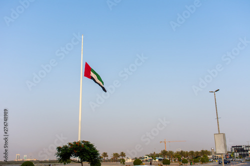 United Arab Emirates Flag flies at half mast due to mourning after the death of a ruler in the United Arab Emirates.