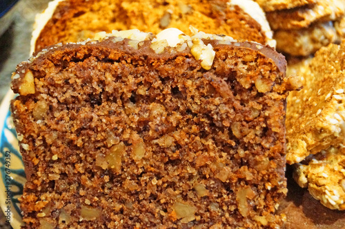 Wallpaper Mural Christmas muffins with nuts and biscuits with powdered sugar on a decorative blue plate on the Christmas table Torontodigital.ca