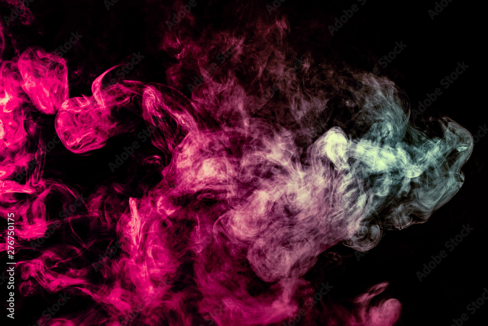 Fototapeta premium Colored background with winding clouds of smoke from patterns of different forms of pink, green and blue colors with tongues of flame on a black isolated background