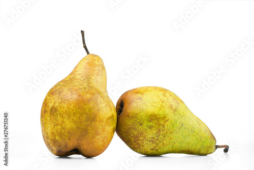 Two ripe pears are isolated on a white background.