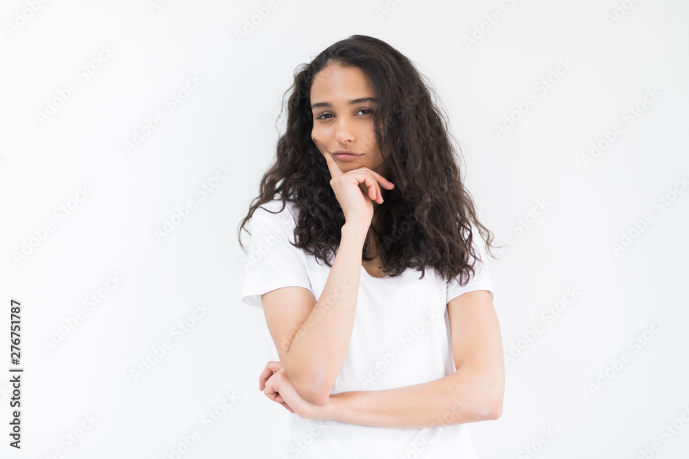 Close up portrait of charming and lovely young woman looks away keep her hand on the chin isolated on white background with copy space for text Close up portrait of charming and lovely young woman looks away keep her hand on the chin isolated on white background with copy space for text
