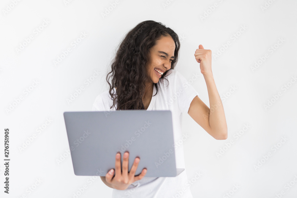 Young beautiful woman having an laptop in hands isolated on white background Young beautiful woman having an laptop in hands isolated on white background