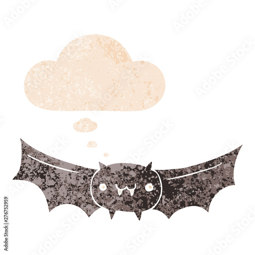 cartoon vampire bat and thought bubble in retro textured style
