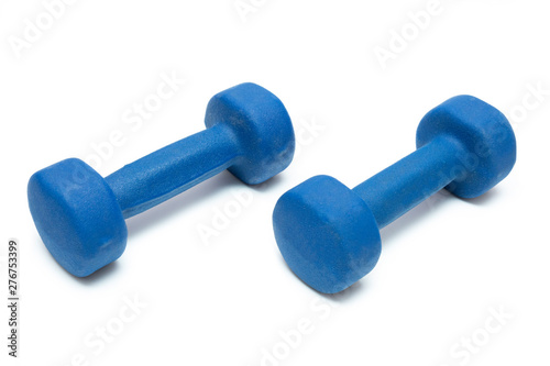 pair of light blue dumbbells for fitness isolated