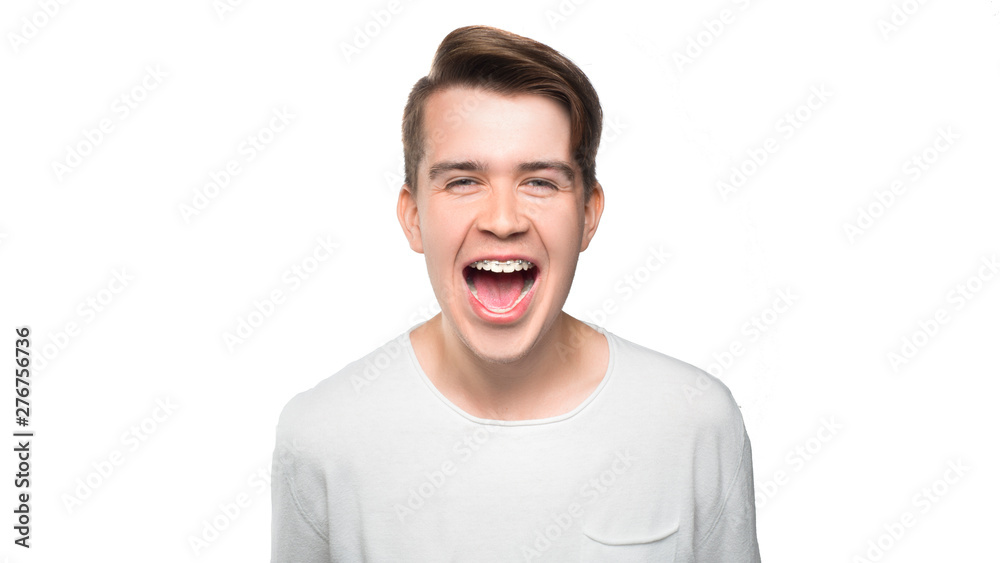 Happy young man saying yeah. Isolated on white background. Happy young man saying yeah. Isolated on white background.