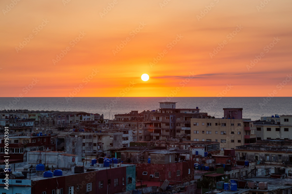 Aerial view of the residential neighborhood in the Havana City, Capital of Cuba, during a colorful sunset.