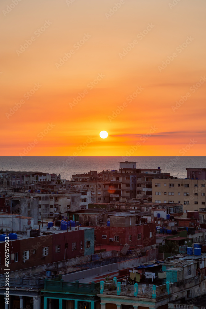 Aerial view of the residential neighborhood in the Havana City, Capital of Cuba, during a colorful sunset.