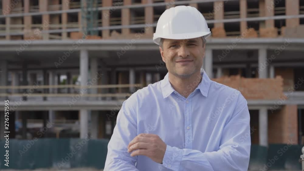 Senior architect or engineer confident and happy with a big natural smile laughing 4K Senior architect or engineer confident and happy with a big natural smile laughing 4K
