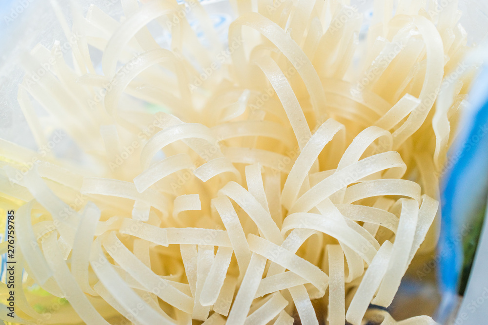 Raw Rice Noodle in Plastic Package / Container Ready to Use. Raw Rice Noodle in Plastic Package / Container Ready to Use.