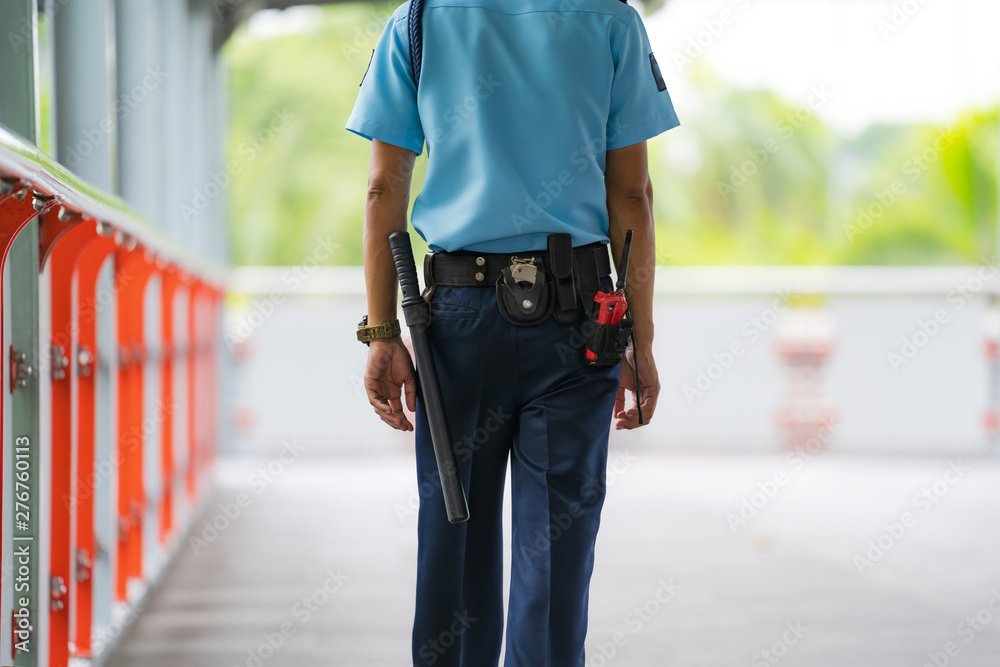 Security guard officers are checking the area Security guard officers are checking the area